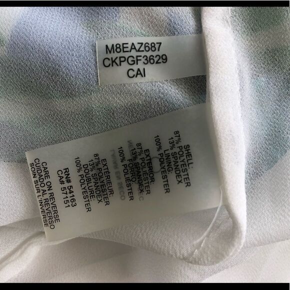 Calvin Klein size large cold shoulder back zip top - Picture 9 of 9